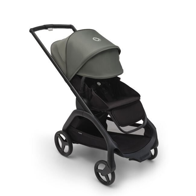 Bugaboo Dragonfly seat stroller with black chassis, midnight black fabrics and forest green sun canopy. The sun canopy is fully extended.