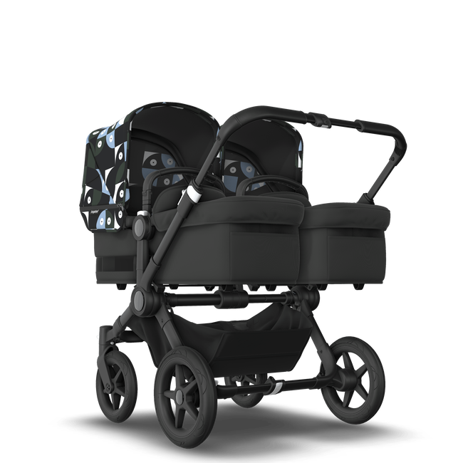 Bugaboo Donkey 5 Twin bassinet and seat stroller black base, midnight black fabrics, animal explorer green/light blue sun canopy