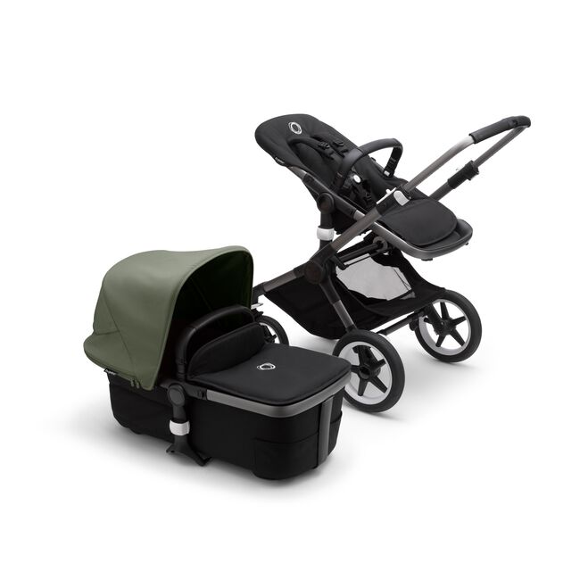 Bugaboo Fox 3 bassinet and seat stroller with graphite frame, black fabrics, and forest green sun canopy. - Main Image Slide 5 of 7