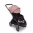 Bugaboo Dragonfly seat stroller with black chassis, midnight black fabrics and morning pink sun canopy. The sun canopy is fully extended. - Thumbnail Slide 3 of 16