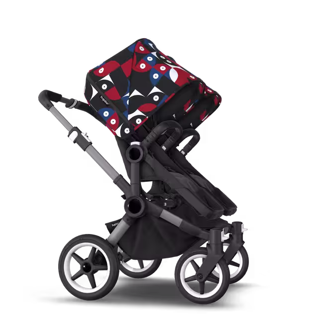 Bugaboo Donkey 5 twin stroller graphite base, midnight black fabrics, animal explorer red/blue sun canopy - Main Image Slide 4 van 12