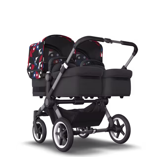 Bugaboo Donkey 5 twin stroller graphite base, midnight black fabrics, animal explorer red/blue sun canopy - Main Image Slide 1 van 12
