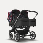 Bugaboo Donkey 5 twin stroller graphite base, midnight black fabrics, animal explorer red/blue sun canopy