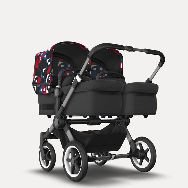 Bugaboo Donkey 5 twin stroller graphite base, midnight black fabrics, animal explorer red/blue sun canopy - Main Image Slide 1 of 12