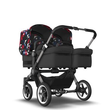 Bugaboo Donkey 5 twin stroller graphite base, midnight black fabrics, animal explorer red/blue sun canopy