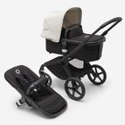 Bugaboo Fox 5 bassinet and seat stroller with black chassis, midnight black fabrics and misty white sun canopy.