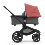 Side view of the Bugaboo Fox 5 bassinet stroller with black chassis, grey melange fabrics and sunrise red sun canopy. - Thumbnail Modal Image Slide 3 of 15