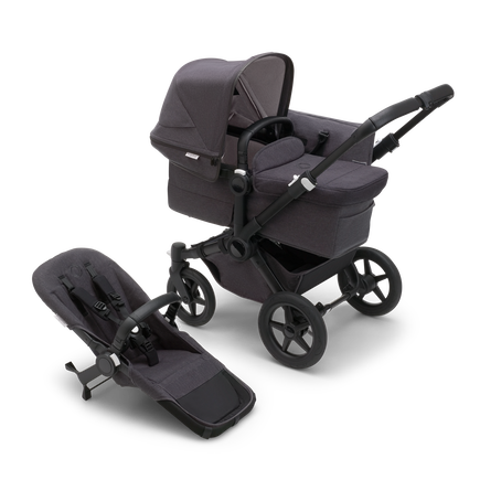 Bugaboo Donkey 5 Mono bassinet stroller with black chassis, mineral washed black fabrics and mineral washed black sun canopy, plus seat. - view 1