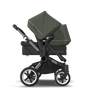 Bugaboo Donkey 5 Duo bassinet and seat stroller graphite base, midnight black fabrics, forest green sun canopy - Thumbnail Slide 4 of 12