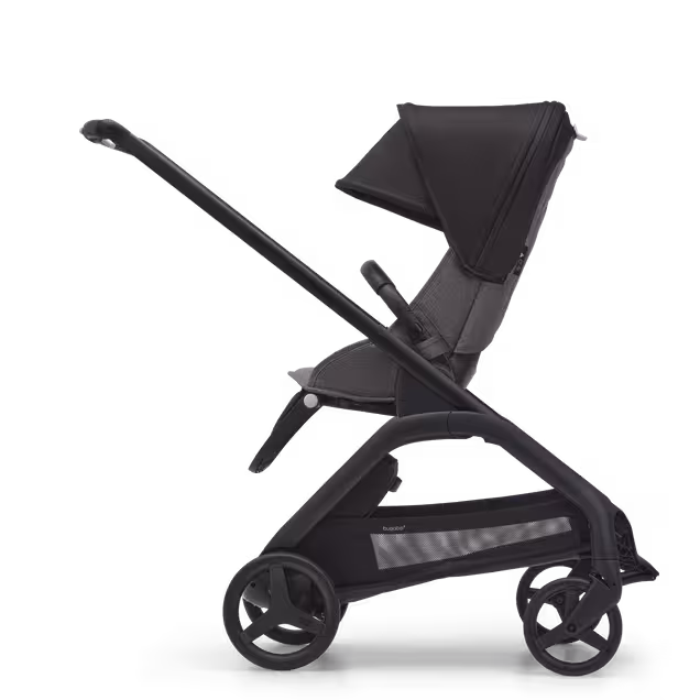 Side view of the Bugaboo Dragonfly seat stroller with black chassis, grey melange fabrics and midnight black sun canopy. - Main Image Slide 2 of 16
