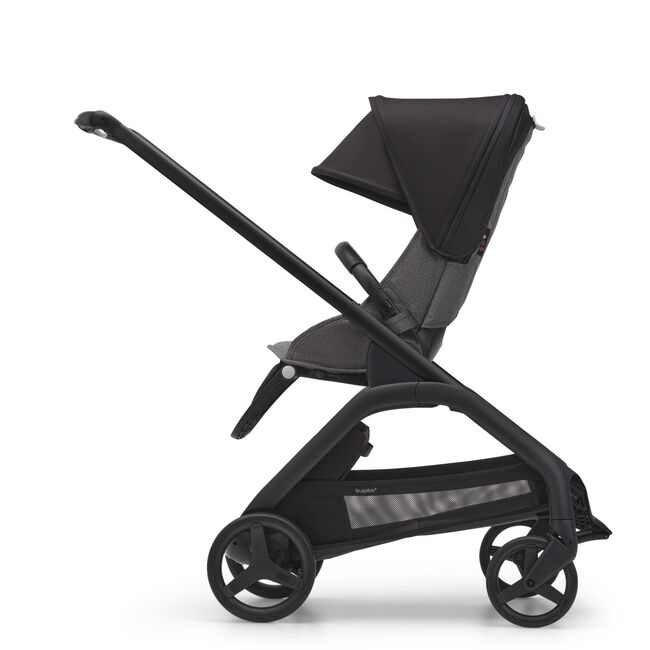 Side view of the Bugaboo Dragonfly seat stroller with black chassis, grey melange fabrics and midnight black sun canopy. - Main Image Slide 3 of 18