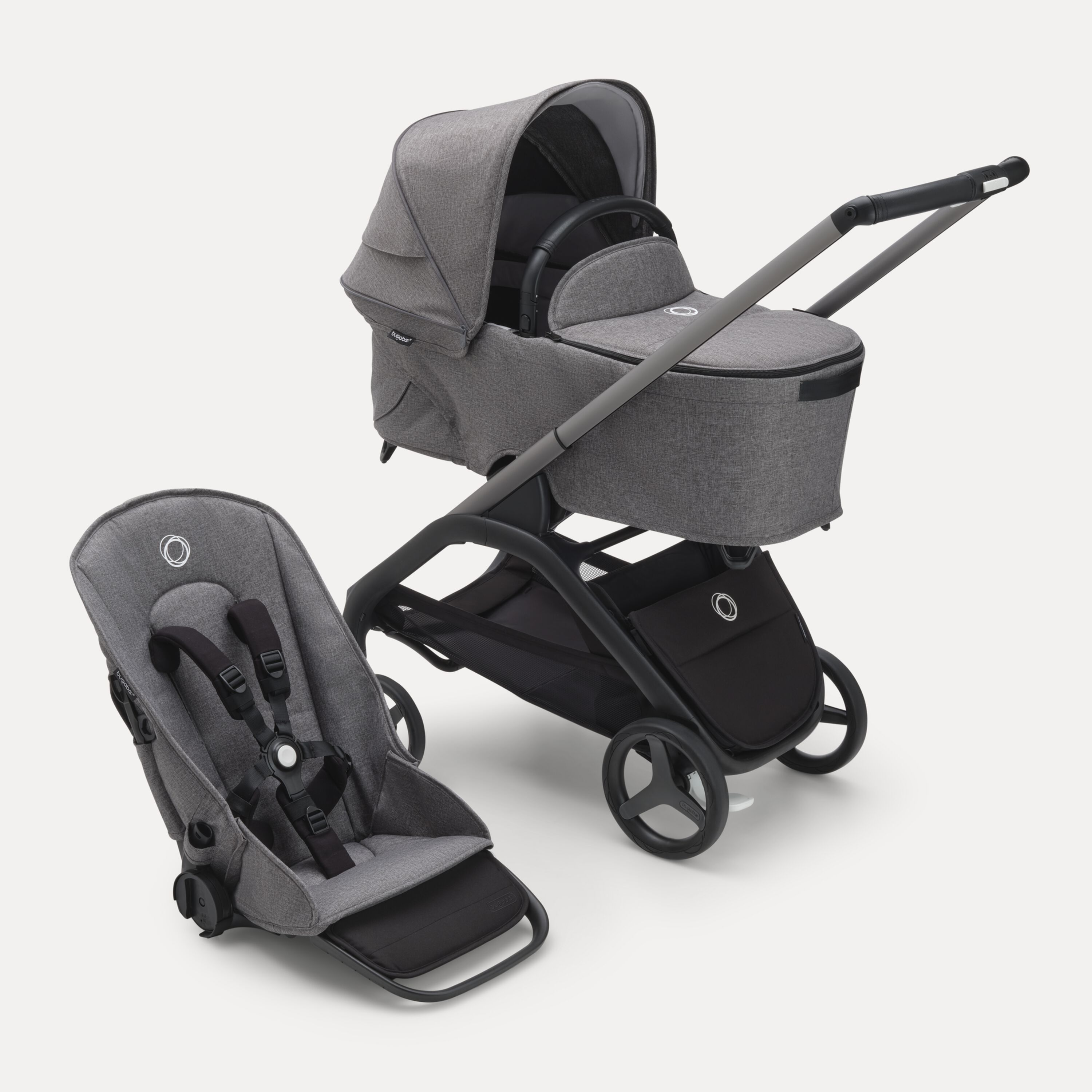 Bugaboo Dragonfly bassinet and seat stroller with graphite chassis, grey melange fabrics and grey melange sun canopy. - Main Modal Image Slide 1 of 16