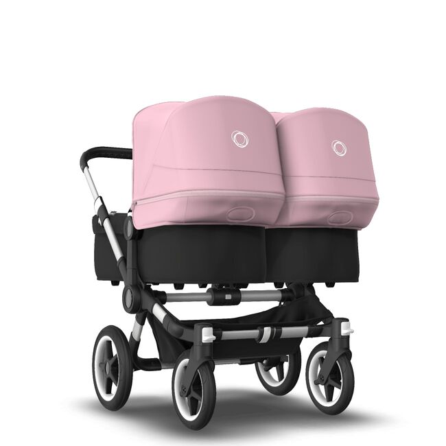 Bugaboo Donkey 3 Twin seat and bassinet stroller soft pink sun canopy, black fabrics, aluminium base - Main Image Slide 1 van 9