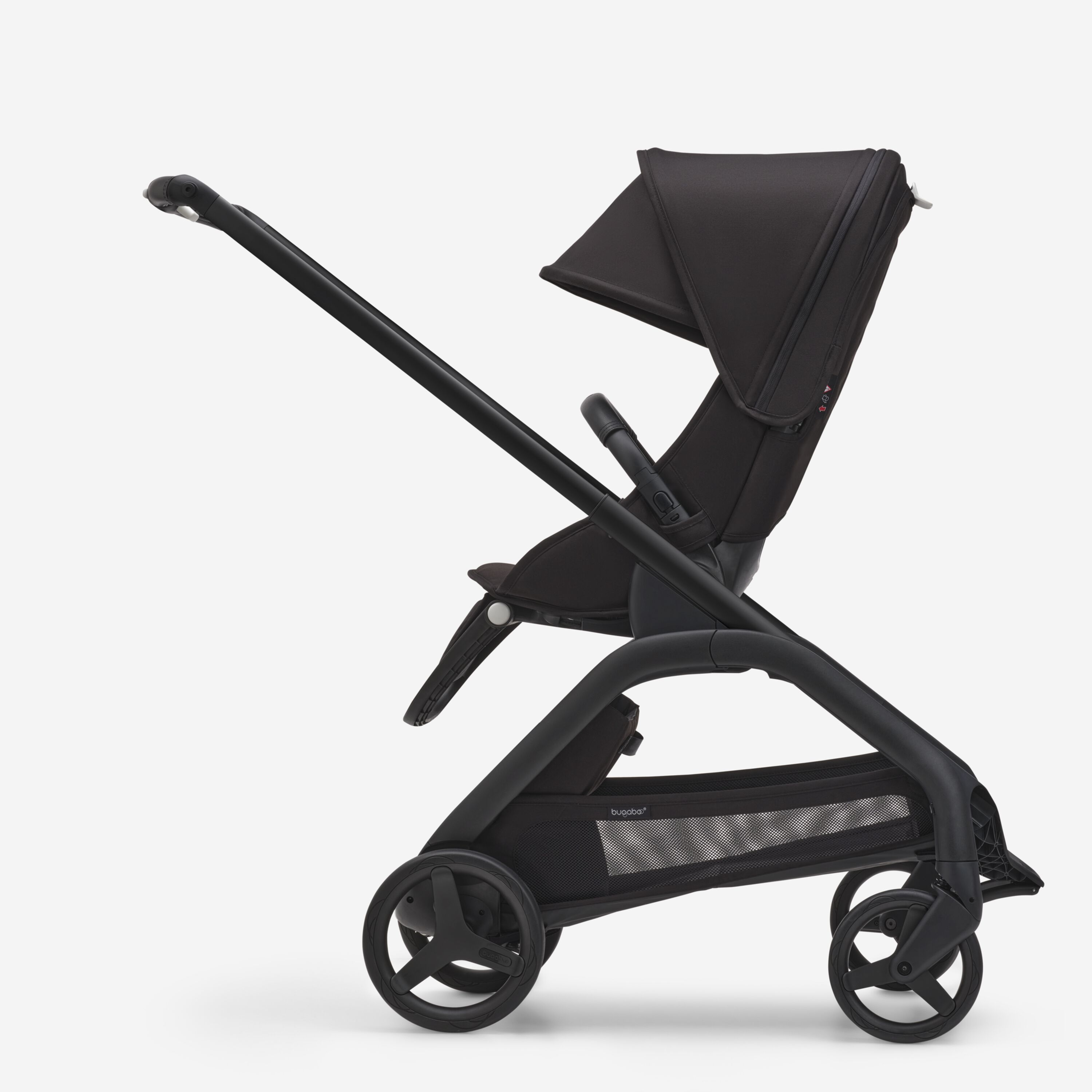 Side view of the Bugaboo Dragonfly seat stroller with black chassis, midnight black fabrics and midnight black sun canopy. - Main Modal Image Slide 2 of 16