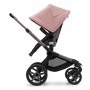 Side view of the Bugaboo Fox 5 seat stroller with graphite chassis, grey melange fabrics and morning pink sun canopy.