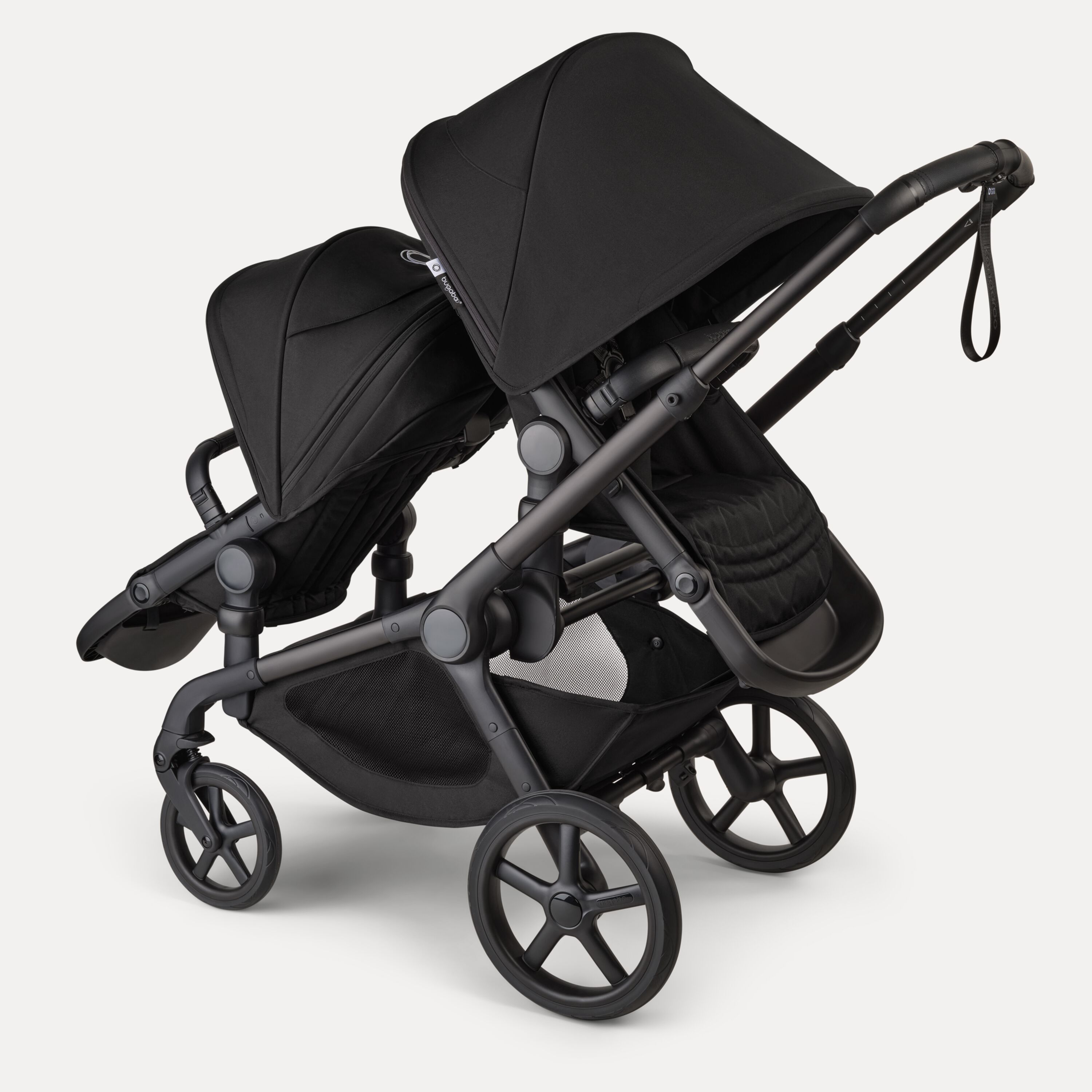 Bugaboo Kangaroo 2-in-1 tandem stroller with one seat facing the parent and one seat facing the world, with Midnight Black fabrics and Midnight Black sun canopies. - Main Modal Image Slide 5 of 18