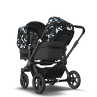 Bugaboo Donkey 5 Duo bassinet and seat stroller black base, midnight black fabrics, animal explorer green/ light blue sun canopy