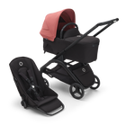 Poussette siège et nacelle Bugaboo Dragonfly avec châssis noir, habillages nuit noire et capote rouge sunrise.