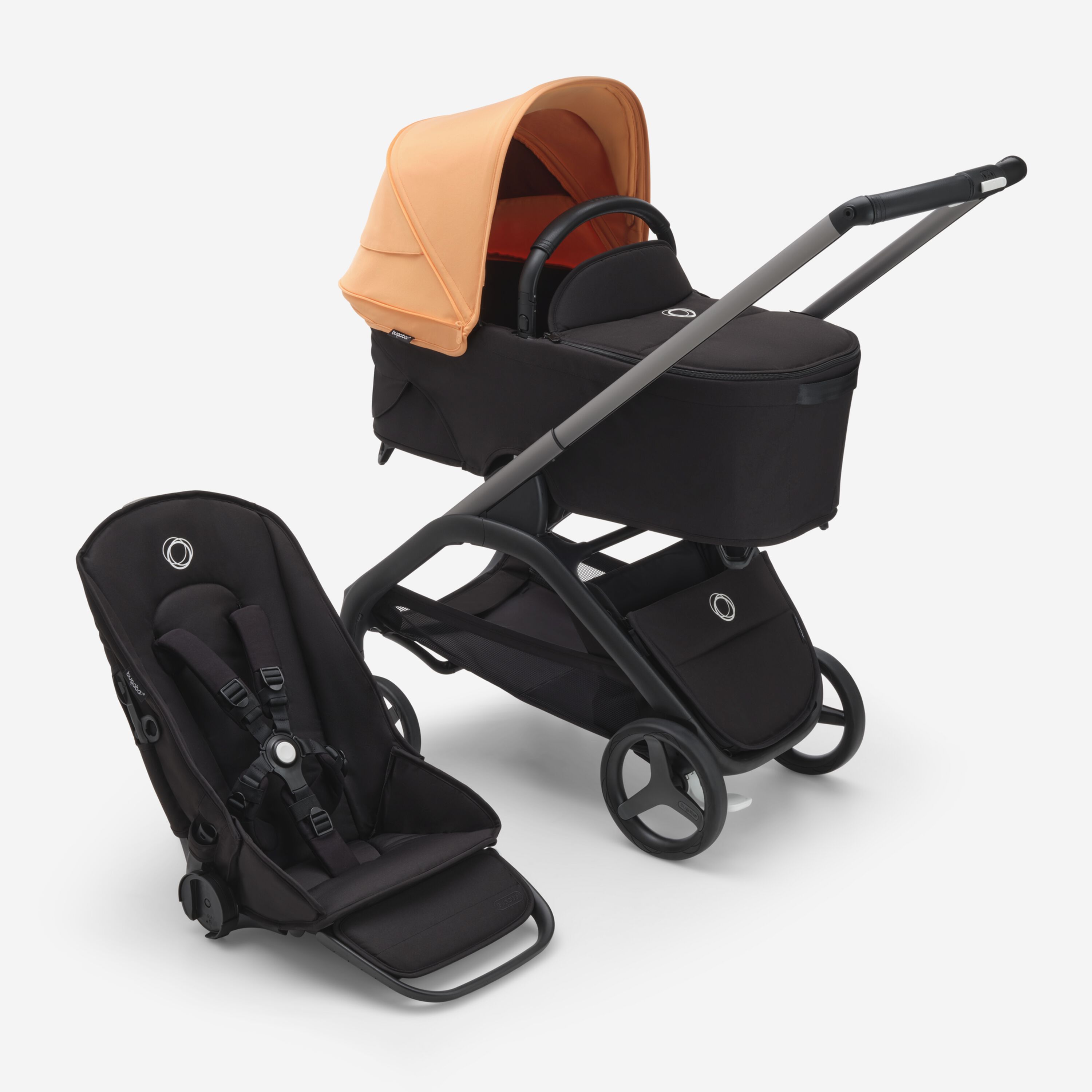 Bugaboo Dragonfly bassinet and seat stroller with graphite chassis, midnight black fabrics and island coral sun canopy. - Main Modal Image Slide 1 of 15