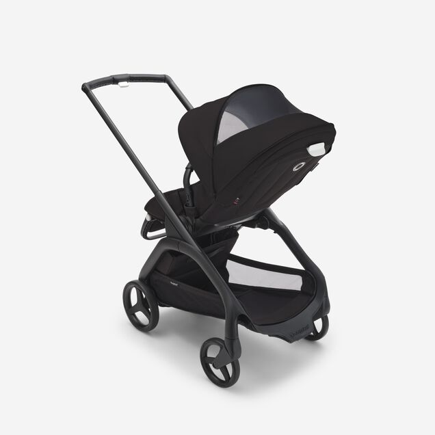 View from behind of the Bugaboo Dragonfly seat stroller, showing the peek-a-boo panel on the sun canopy. - Main Image Slide 11 of 16