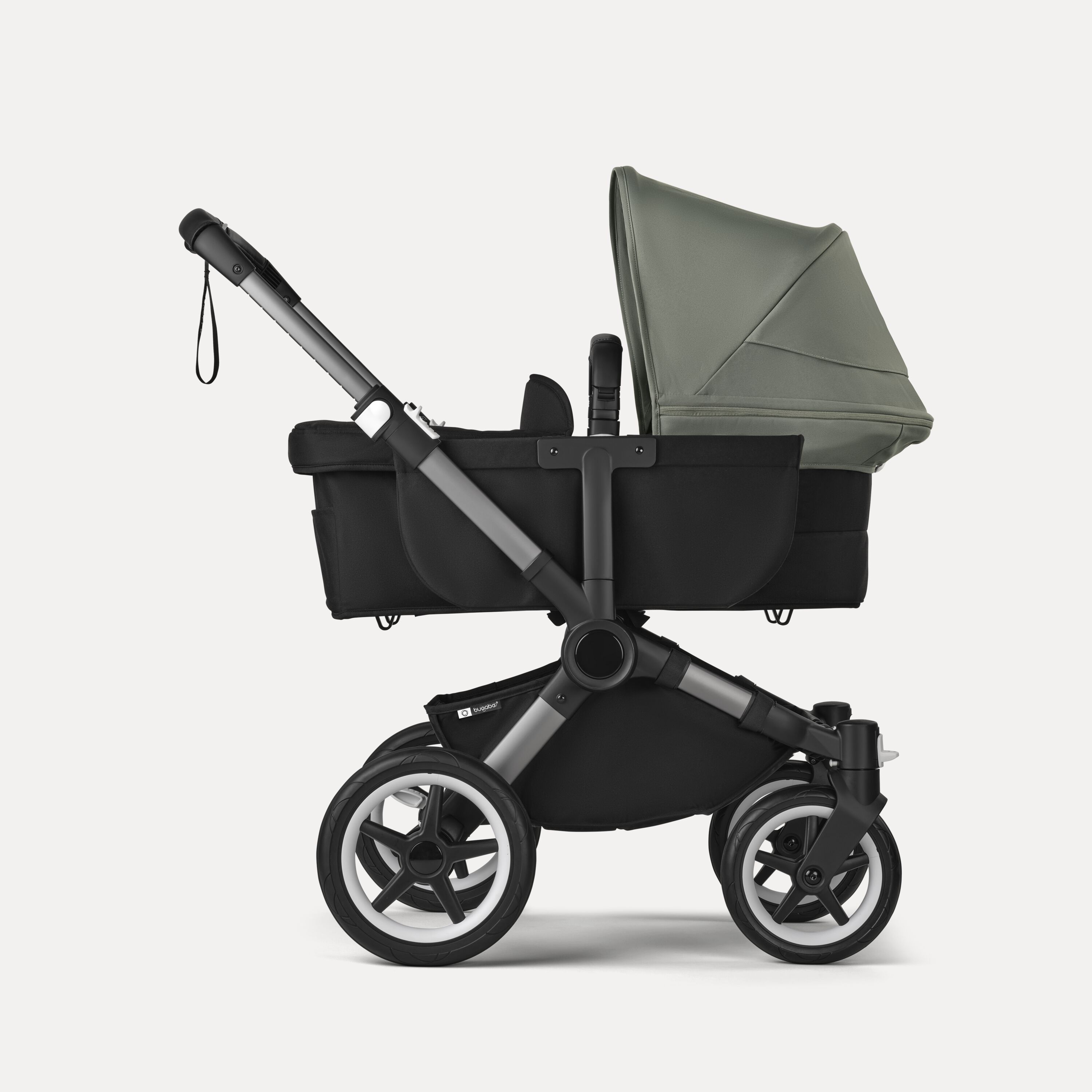 Refurbished Bugaboo Donkey 5 Mono bassinet and seat stroller graphite base, midnight black fabrics, forest green sun canopy - Main Modal Image Slide 3 of 4