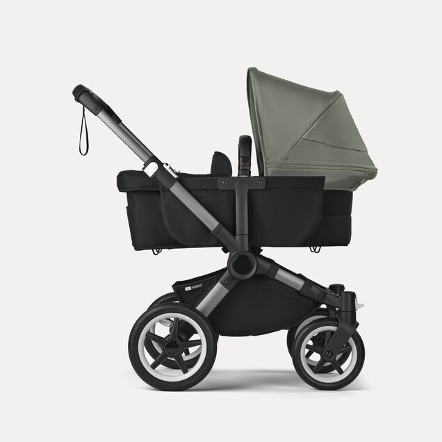 Refurbished Bugaboo Donkey 5 Mono bassinet and seat stroller graphite base, midnight black fabrics, forest green sun canopy - Main Image Slide 3 of 4