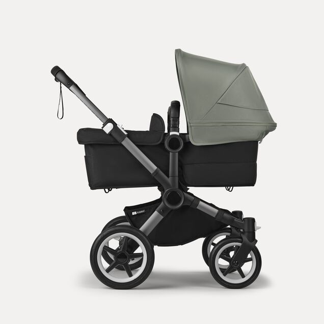 Bugaboo Donkey 5 twin stroller graphite base, midnight black fabrics, forest green sun canopy - Main Image Slide 2 of 12