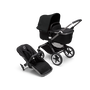 Bugaboo Fox 3 bassinet and seat stroller with graphite frame, black fabrics, and black sun canopy.