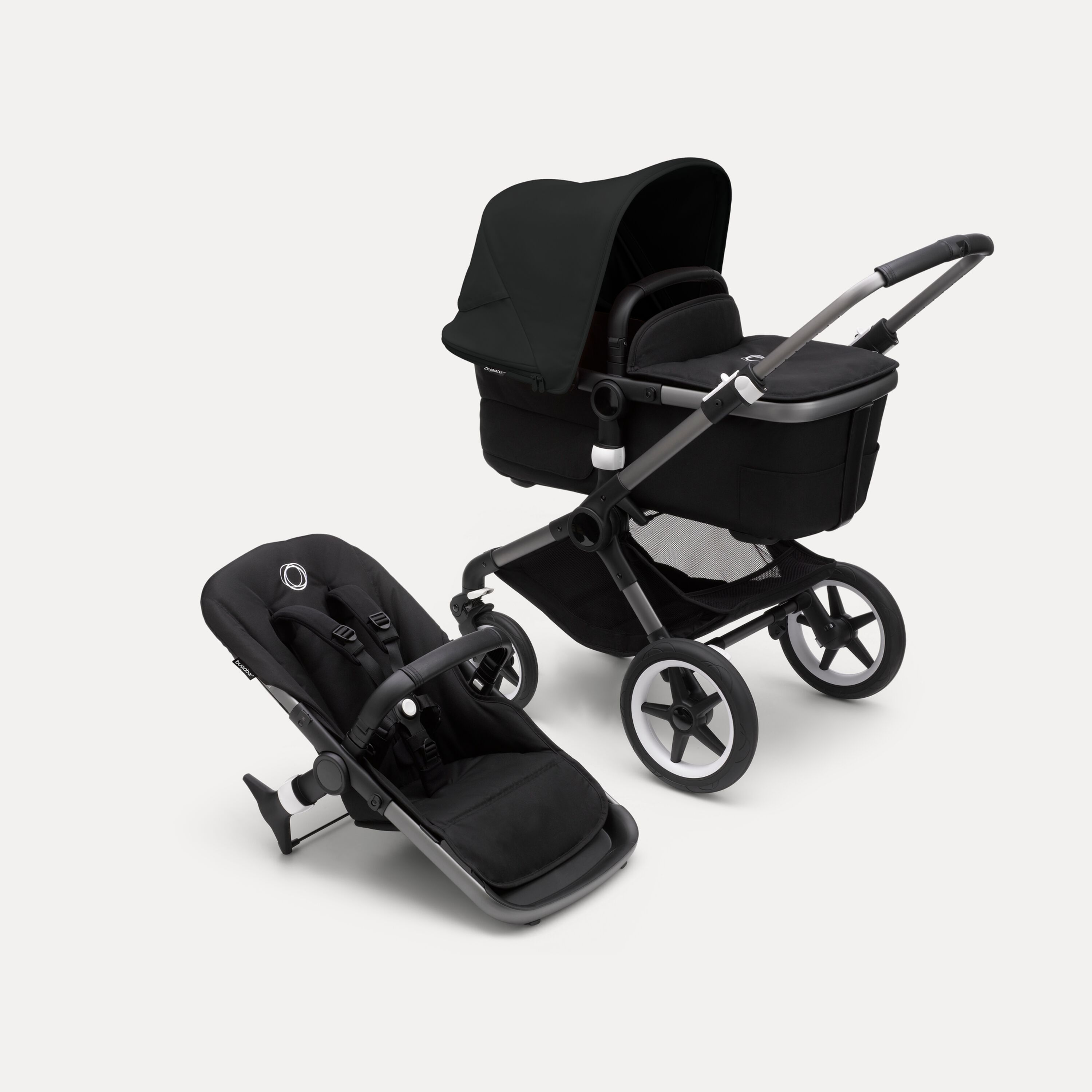 Bugaboo Fox 3 bassinet and seat stroller with graphite frame, black fabrics, and black sun canopy. - Main Modal Image Slide 5 of 7