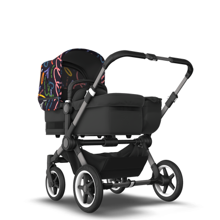 Bugaboo Donkey 5 Mono bassinet and seat stroller graphite base, midnight black fabrics, art of discovery dark blue sun canopy - view 1