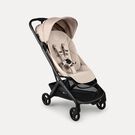 Bugaboo Butterfly 2 ultra-compact travel stroller with black chassis, Desert Taupe fabrics, and Desert Taupe sun canopy.