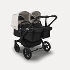 Bugaboo Donkey 5 twin stroller black base, midnight black fabrics, misty white sun canopy