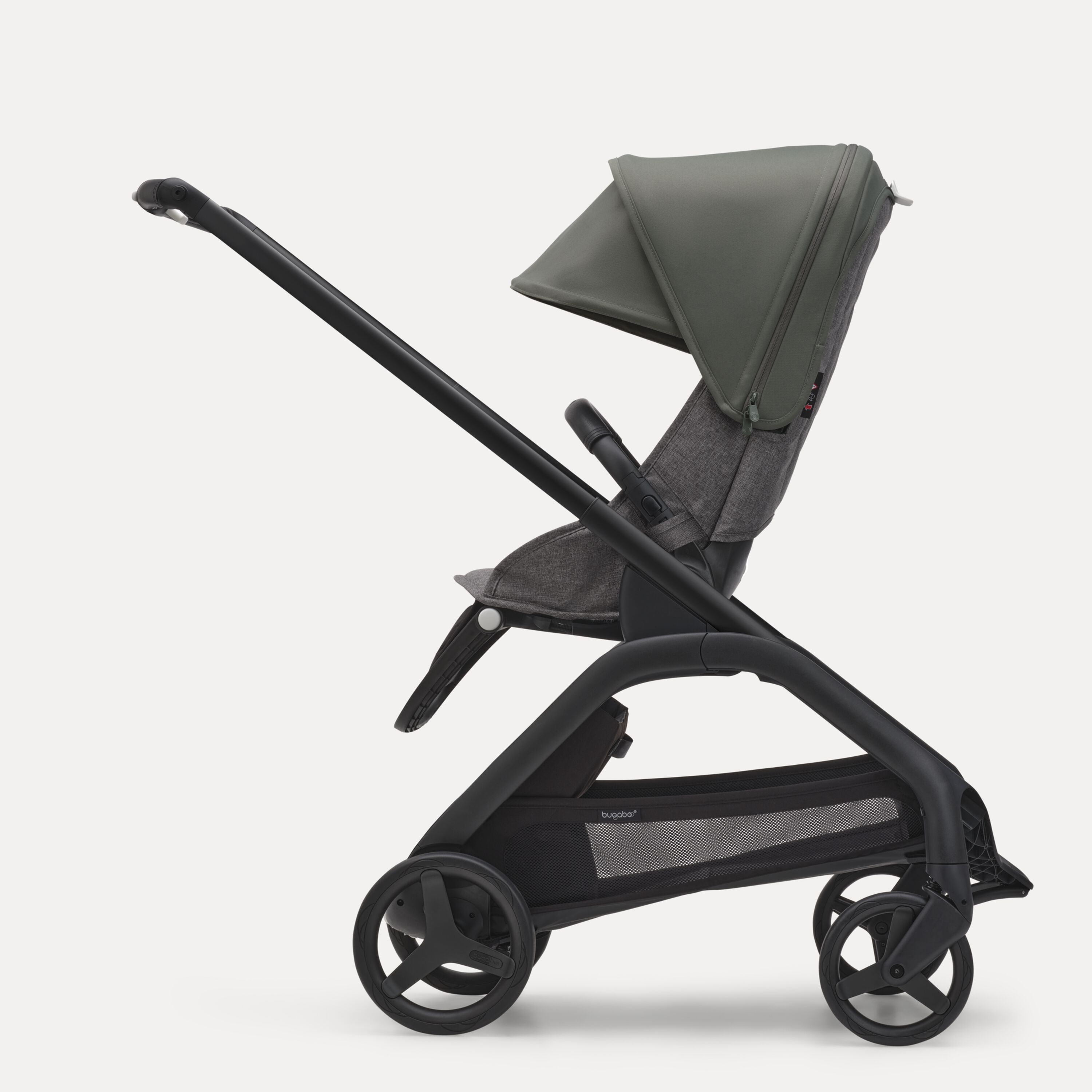 Side view of the Bugaboo Dragonfly seat stroller with black chassis, grey melange fabrics and forest green sun canopy. - Main Modal Image Slide 2 of 16