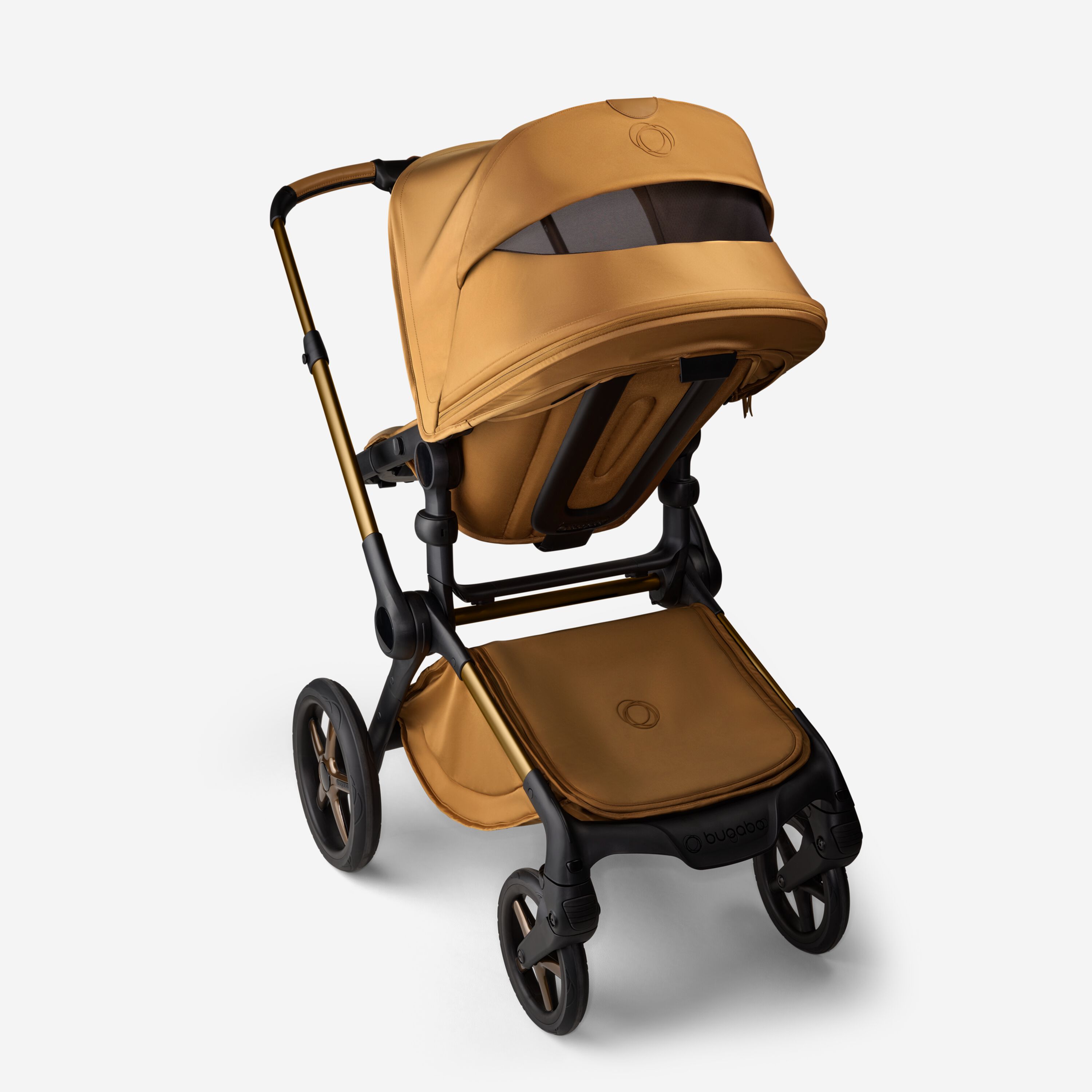 Back view of the Bugaboo Fox 5 Noir Limited Edition stroller in Amber Glow, with the sun canopy's peek-a-boo panel visible. - Main Modal Image Slide 5 of 15