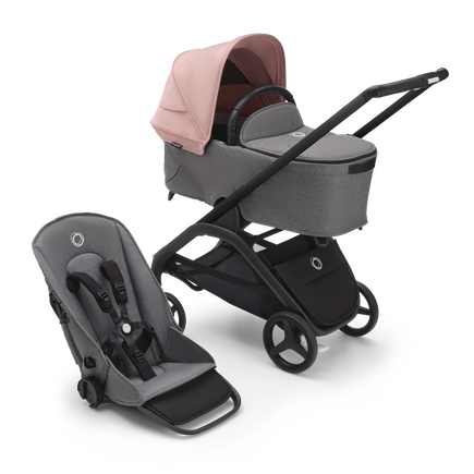 Bugaboo Dragonfly bassinet and seat stroller with black chassis, grey melange fabrics and morning pink sun canopy.