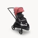 Bugaboo Dragonfly seat stroller with black chassis, grey melange fabrics and sunrise red sun canopy.