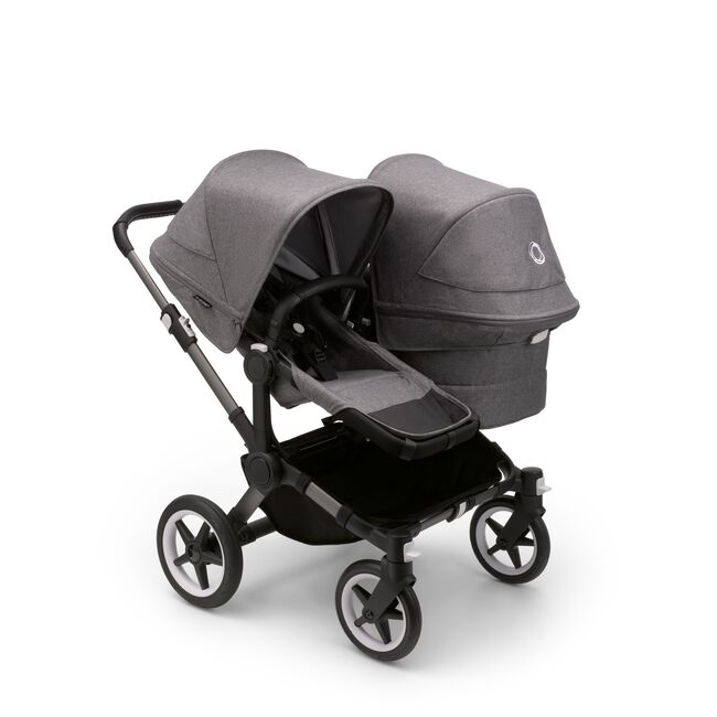 Bugaboo Donkey 5 Duo seat and bassinet stroller with graphite chassis, grey melange fabrics and grey melange sun canopy. - Main Image Slide 1 of 12