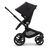 Side view of the Bugaboo Fox 5 seat pram with black chassis, forest green fabrics and forest green sun canopy. - Thumbnail Slide 3 of 13