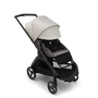 Bugaboo Dragonfly seat stroller with black chassis, grey melange fabrics and misty white sun canopy. The sun canopy is fully extended. - Thumbnail Slide 4 of 18