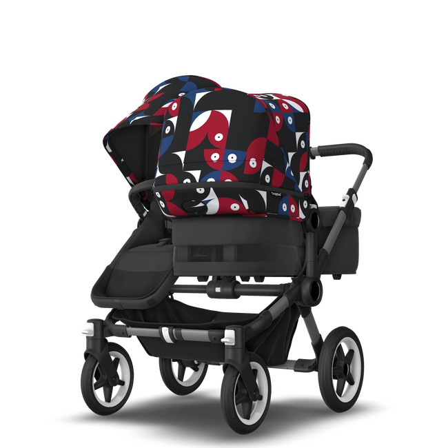 Bugaboo Donkey 5 Duo bassinet and seat stroller graphite base, midnight black fabrics, animal explorer red/ blue sun canopy