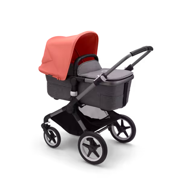 Bugaboo Fox 3 bassinet stroller with graphite frame, grey fabrics, and red sun canopy. - Main Image Slide 2 of 7