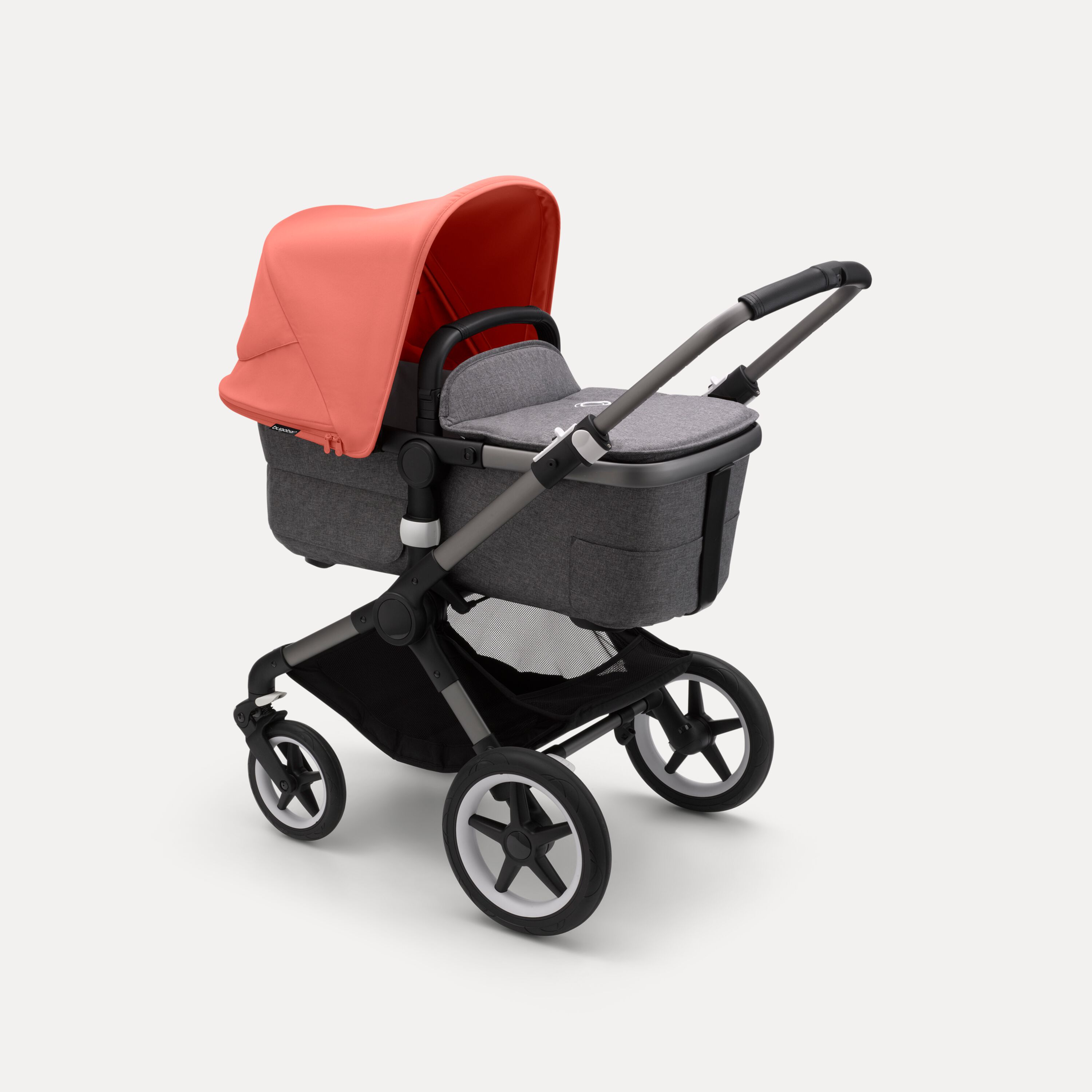 Bugaboo Fox 3 bassinet stroller with graphite frame, grey fabrics, and red sun canopy. - Main Modal Image Slide 2 of 7
