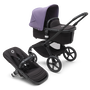 Bugaboo Fox 5 bassinet and seat pram with black chassis, midnight black fabrics and astro purple sun canopy. - Thumbnail Modal Image Slide 1 of 13