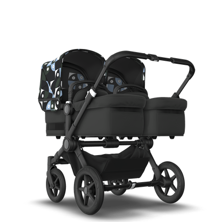 Bugaboo Donkey 5 Twin bassinet and seat stroller black base, midnight black fabrics, animal explorer green/light blue sun canopy - view 1