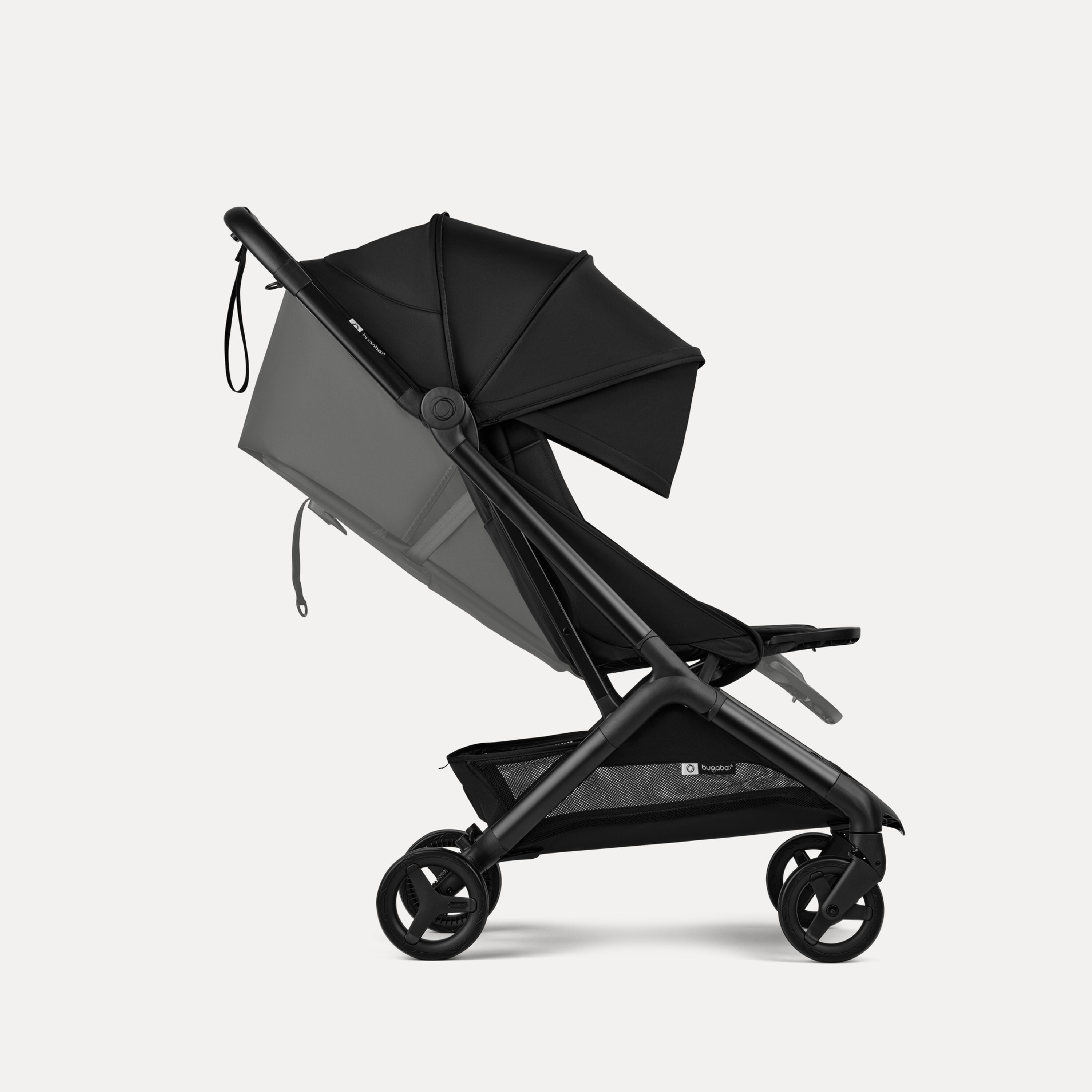 Side view of a Bugaboo Butterfly 2 travel pram. The sun canopy is fully extended. - Main Modal Image Slide 5 of 9
