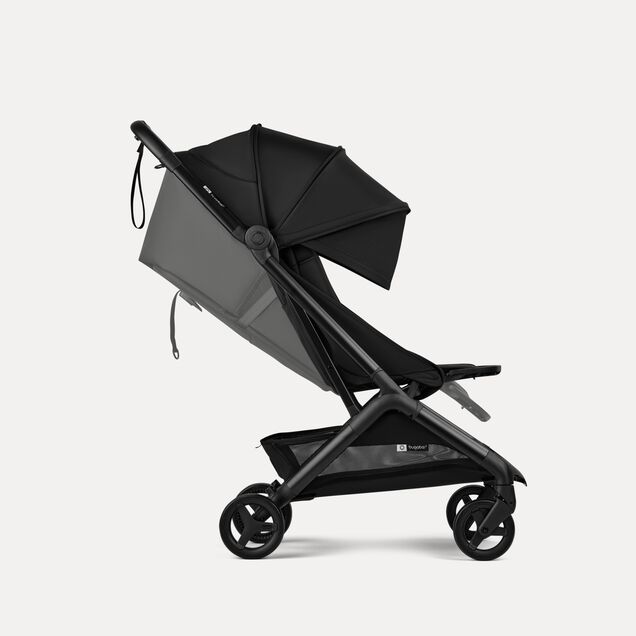 Side view of a Bugaboo Butterfly 2 travel pram. The sun canopy is fully extended. - Main Image Slide 5 of 9