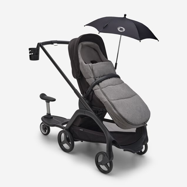 Bugaboo Dragonfly stroller with various accessories: sun canopy, footmuff, cup holder and comfort wheeled board. - Main Image Slide 16 of 16