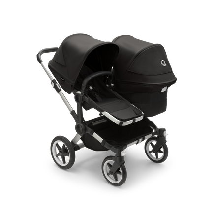 Bugaboo Donkey 5 Duo seat and bassinet stroller with aluminium chassis, midnight black fabrics and midnight black sun canopy.