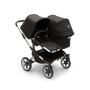 Bugaboo Donkey 5 Duo seat and bassinet stroller with aluminium chassis, midnight black fabrics and midnight black sun canopy. - Thumbnail Slide 1 of 10