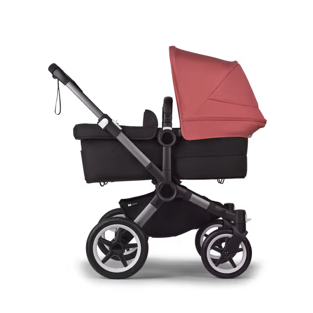 Bugaboo Donkey 5 twin stroller graphite base, midnight black fabrics, sunrise red sun canopy - Main Image Slide 2 of 12